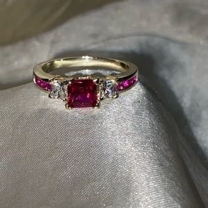 Multi-stone princess cut fashion ring .925  available in ladies size 8 and 10